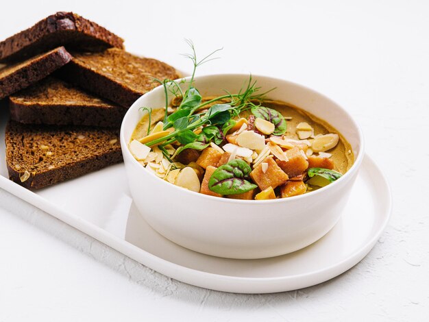 Bowl of soup with garnish